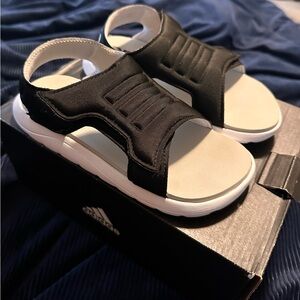 Black and white Adidas comfort C sandals